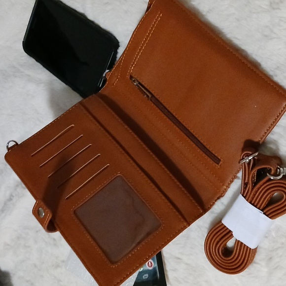 STG hand purse with shoulder strap and slip to put phone. Never used - Picture 12 of 12